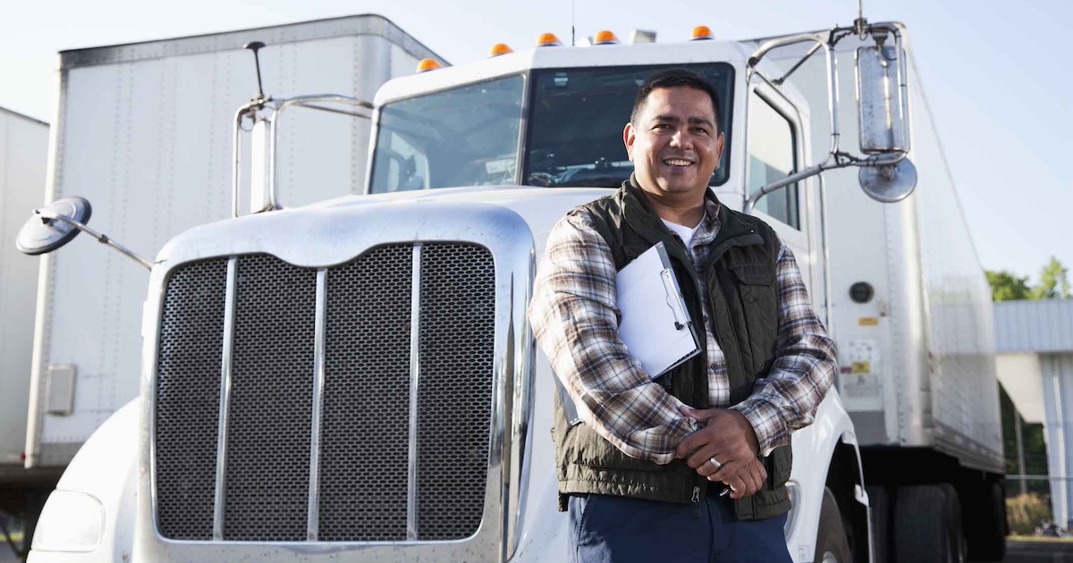 Truck driver holding clipboard Mobi Getty kali9 compressed